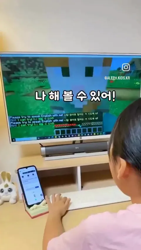 First frame: a child in a headset talking with Annie in Minecraft